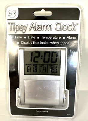 New Sealed SPI Tipsy Alarm Clock with Illuminating Face w/ Time Date Temperature