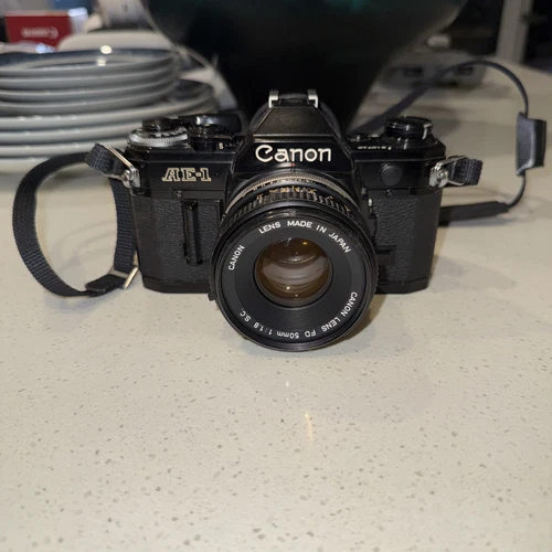 Canon AE-1 PROGRAM 35mm SLR Film Camera Black FD 50mm f/1.8