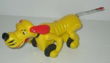 VINTAGE HARD PLASTIC YELLOW 8" BEAGLE HOUND DOG PULL TOY SPRING TAIL CELLULOID 