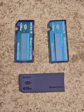 2 SanDisk 256MB Memory Stick Pro Card Magic Gate 1 Sony 128MB Memory Stick.