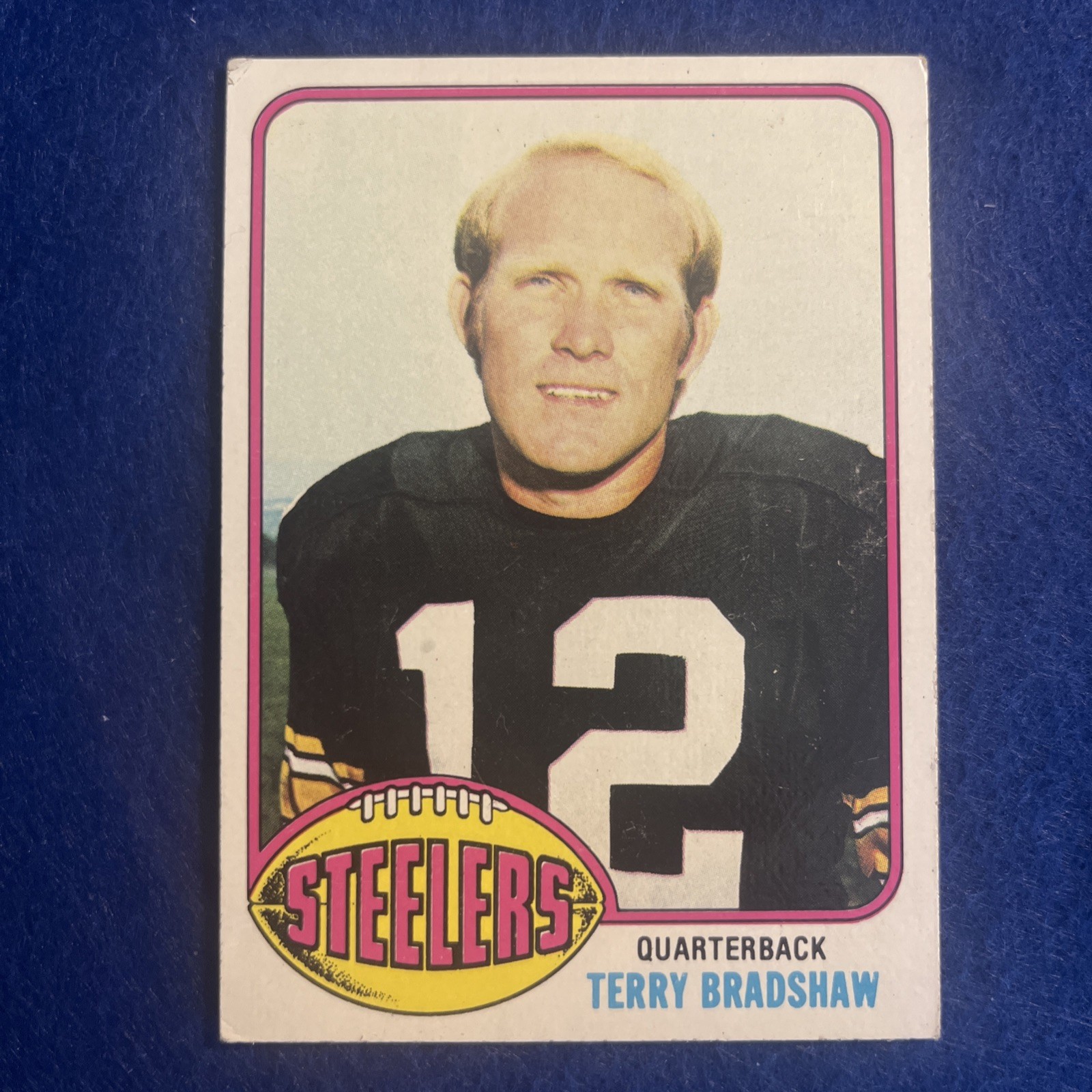 Terry Bradshaw #75 (Football Cards 1976 Topps) — is it worth grading?