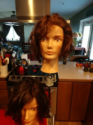 2 Lightly used pivot point mannequin With 1 Clamp to hold your mannequin head
