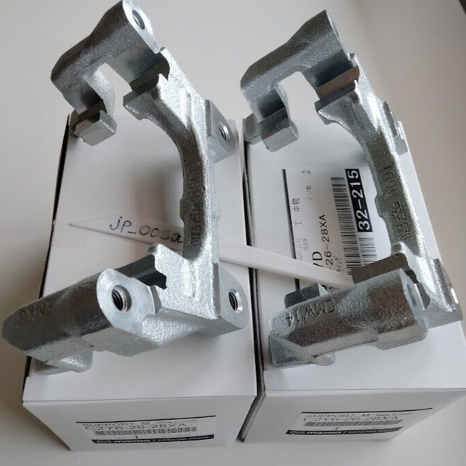 Mazda OEM Caliper Mounting Support Bracket Set LH RH C2Y6-26-28XA