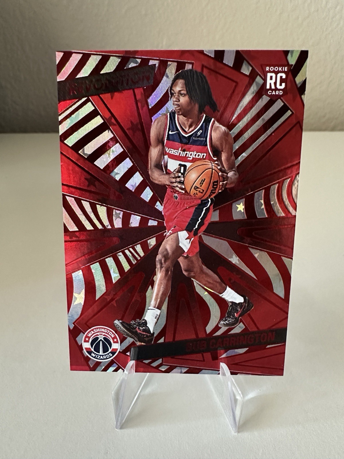 2024-25 Panini Revolution - Rookies Bub Carrington #121 Red Astro /299 (RC)