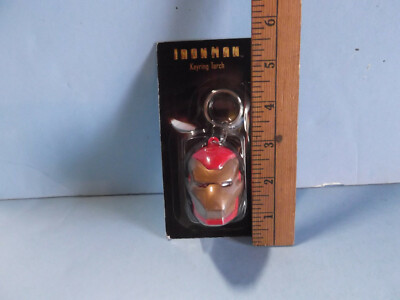 AD56 Unknown 2''in Plastic Ironman Looking Key Chain  ''Requires 2-Lr44 Batteries''