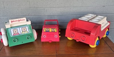 Vintage Johnson& Johnson Toy Trucks & 1 Unbranded Toy