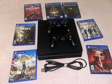 Sony PlayStation 4 1TB CUH-2215B Bundle with 2 Controllers  7 Games