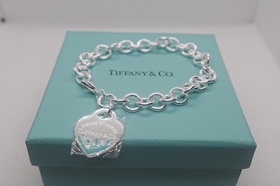 Return toTiiffany&co Blue Enamel Splash Heart Tag Bracelet size 8 