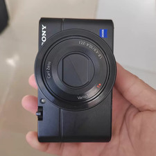 Sony RX100 Compact Digital Camera 20.2 MP 3.6x Optical Zoom with charger