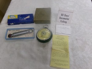 Taylor fishing thermometer and Taylor fishing barameter.  In boxes  Nice