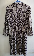 Ellison woman dress size Small warm color.