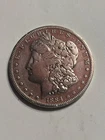 1884 S MORGAN DOLLAR AU+ DETAIL