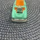 2022 HOT WHEELS CITY SURF 'N TURF BLUE 1:64 DIECAST 2 1/2" CAR W/ ORANGE & WHITE — photo 2