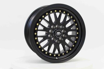 (1) 15x7 +20 MST MT10 5x100,5x114.3 Matte Black w/Gold Rivets Wheel