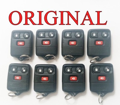 ORIGINAL LOT OF 8 FORD REMOTES OEM FOBS KEY LESS ENTRY BULK LOCKSMITH TRUCKS