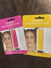 2-pack of Amscan Pink  Yellow Cream Face Makeup for Team Spirit or Costume