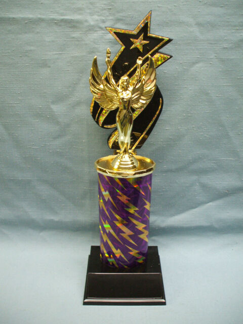 victory trophy award gold lightning purple oval column black star backdrop
