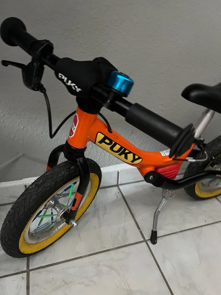 PUKY Alu Laufrad orange LR Ride mit Bremse, Klingel und Seitenständer - Bild 4 von 4