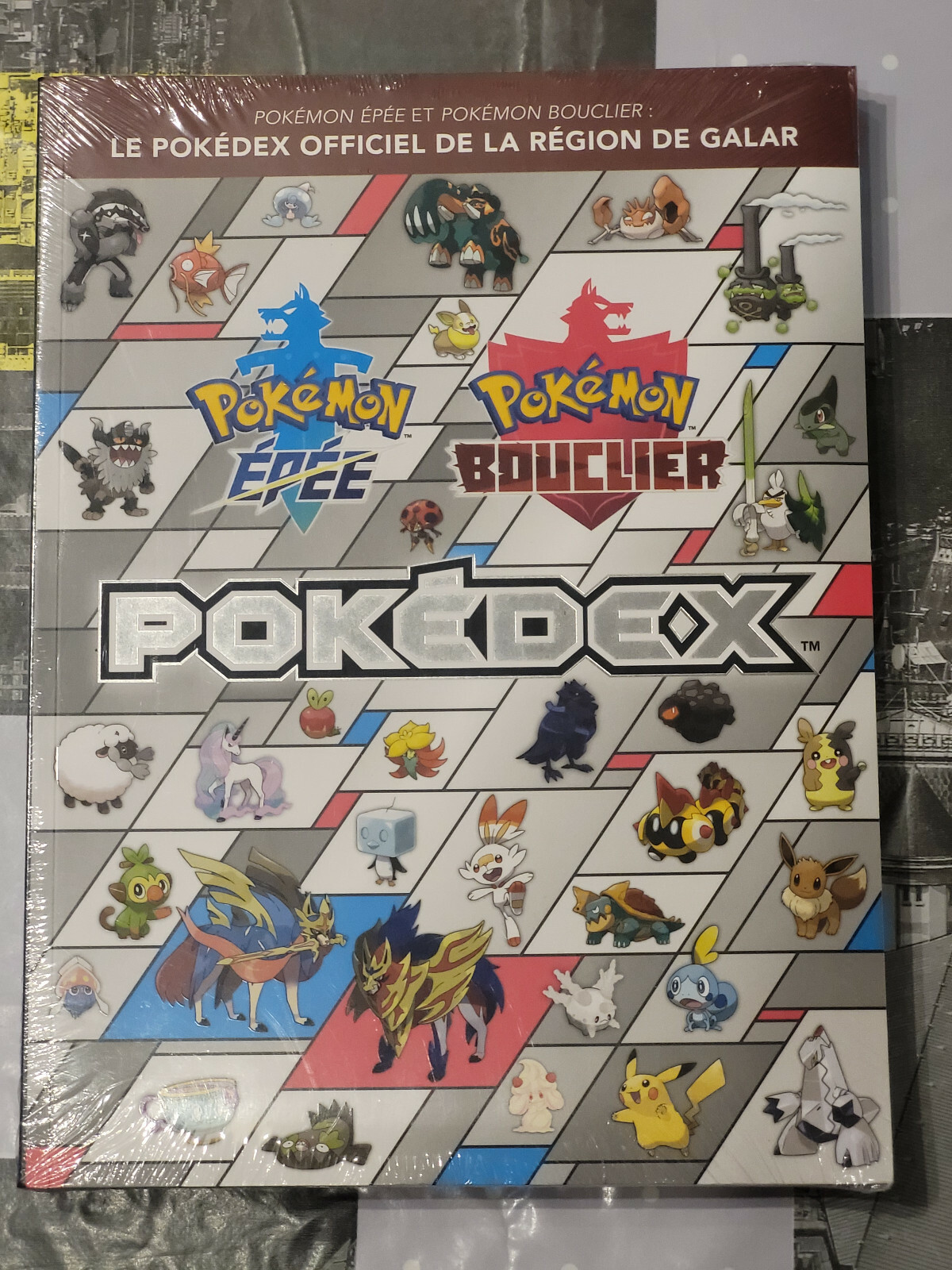 Manuel Pokémon Épée Bouclier sous blister pour collectionneur