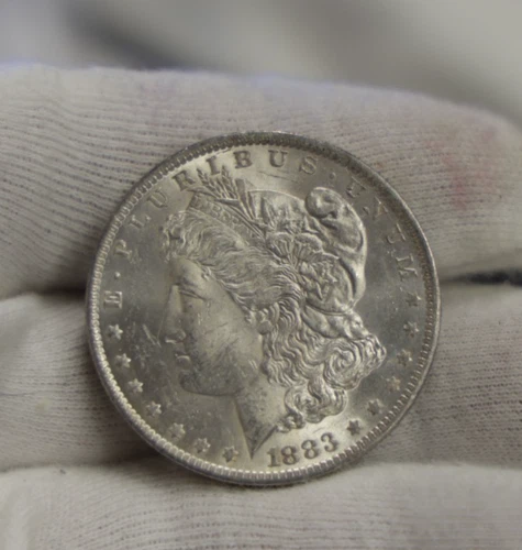 1883 O US Morgan Silver Dollar $1  Unc.