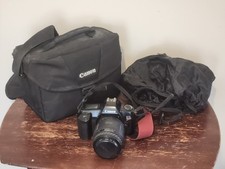 Canon EOS Rebel 35mm film SLR camera with a Sigma UV 52mm lens W/ Cover  Case