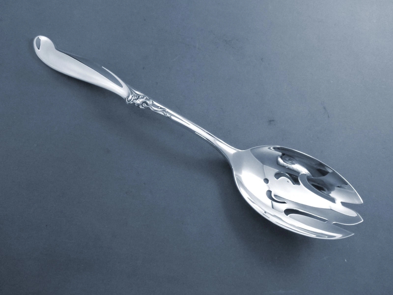 SILVER MELODY-INTERNATIONAL STERLING PIERCED TABLE SERVING SPOON