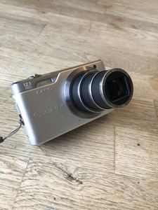 Casio Exilim EX-H5 12.1MP Digital Camera Silver 10x wide zoom VGC