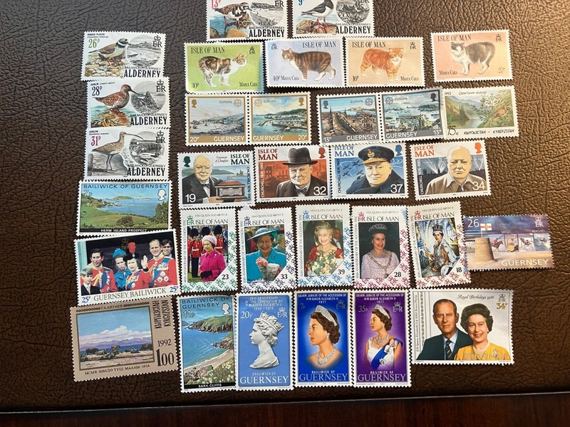 32 MINT HINGED STAMPS FROM THE CHANEL ISLANDS