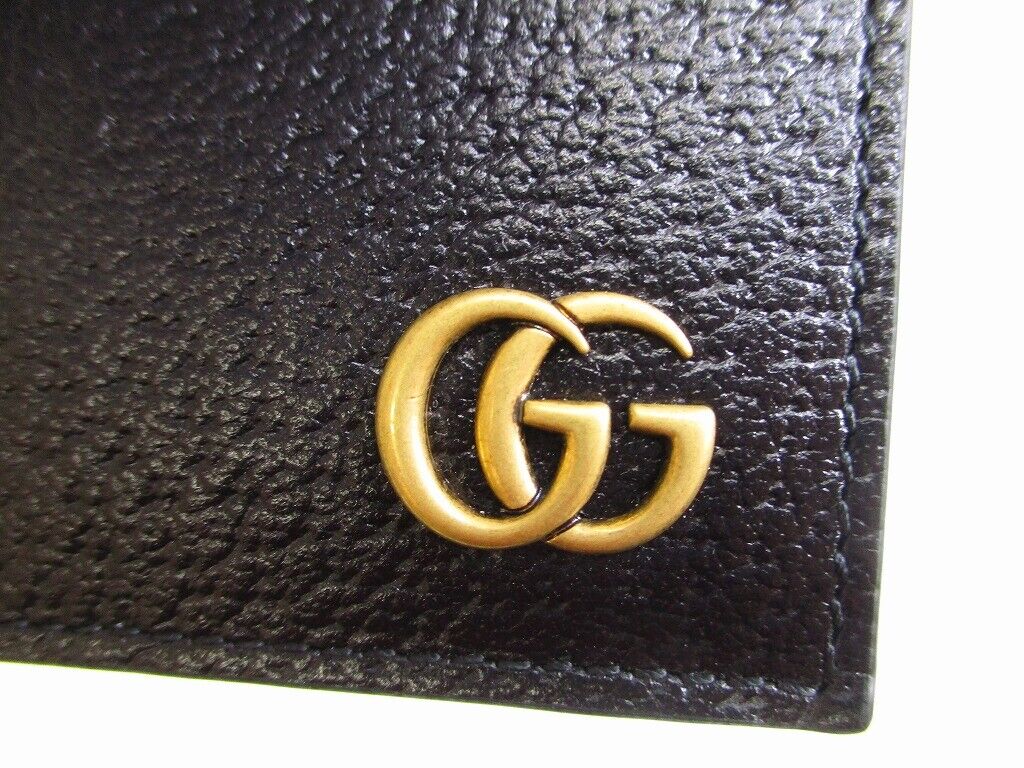 Shop the GG Marmont card case by Gucci. The GG Marmont zippered card case  is completed with a metal ke…