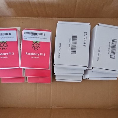 6 Raspberry Pi 3 Model B+ Single Board Computers and 6 enclosures sold as group.