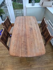 Ercol refrectory dining table and 4 chairs