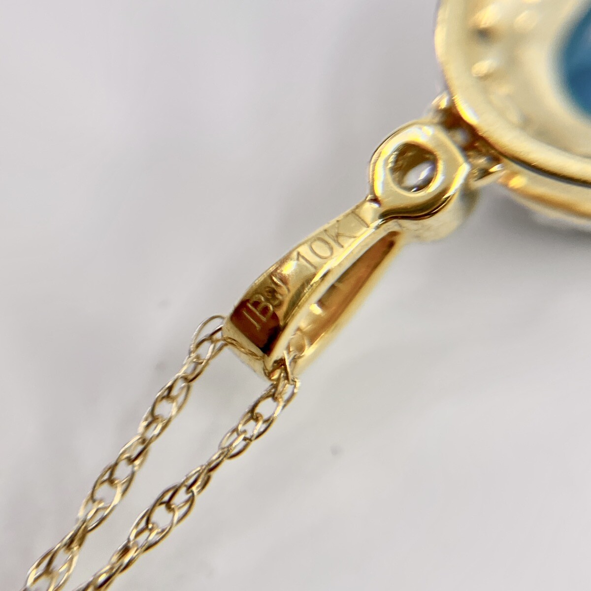 10K Yellow Gold Oval Blue Topaz & 0.15ctw Diamond Halo 18 10K Yellow Gold Oval Blue Topaz & 0.15ctw Diamond Halo 18