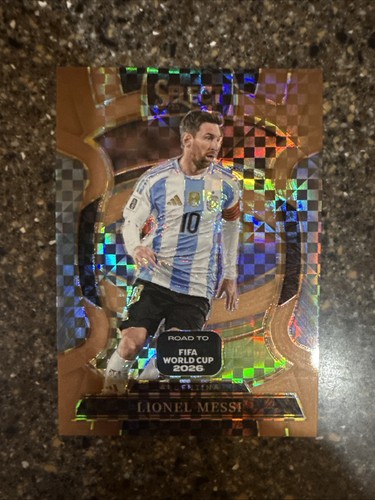 #56 LIONEL MESSI BRONZE CHECKER PRIZM #23/130 - 2025-26 SELECT ROAD TO WORLD CUP