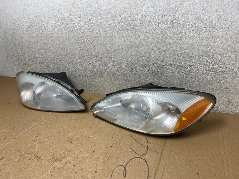 2000 to 2007 Ford Taurus Left+Right Side Set Halogen Headlights Oem U9934 DW - Image 2 of 4