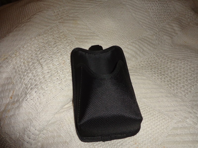 universal walkie talkie pouch clip on or belt loop.