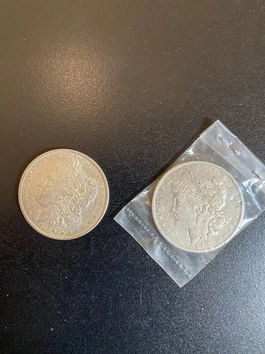 Lot of 2 Morgan silver dollars: 1883 O, 1889 Fine