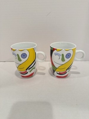 Pair Konitz Porcelain Mugs featuring the Jacqueline with a Hat by Pablo Picasso.