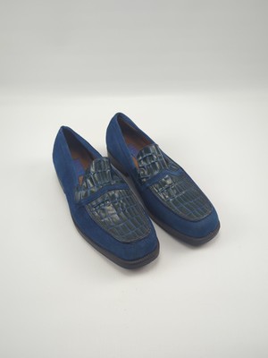 blue suede loafers with crocodile-embossed leather panels on the toe