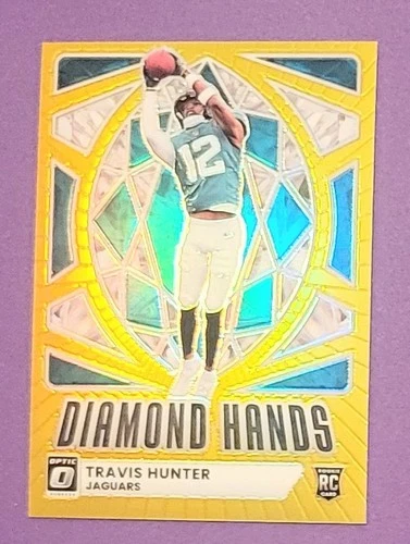 2025 Optic Travis Hunter Gold (Raw)