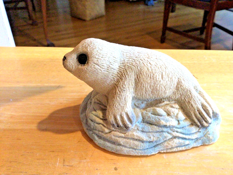 Vtg Sand Art figurine of a white harp seal pup resting on an icy base 2.5x4” +