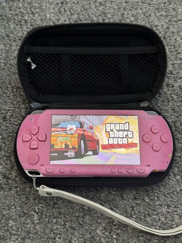 sony Pink PSP console PSP 1003 With Hard Case & 2GB Sandisk Memory Stick Duo