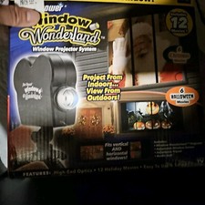 Star Shower 11674 Window Display Projector 12 Movies 6 Christmas 6 Halloween