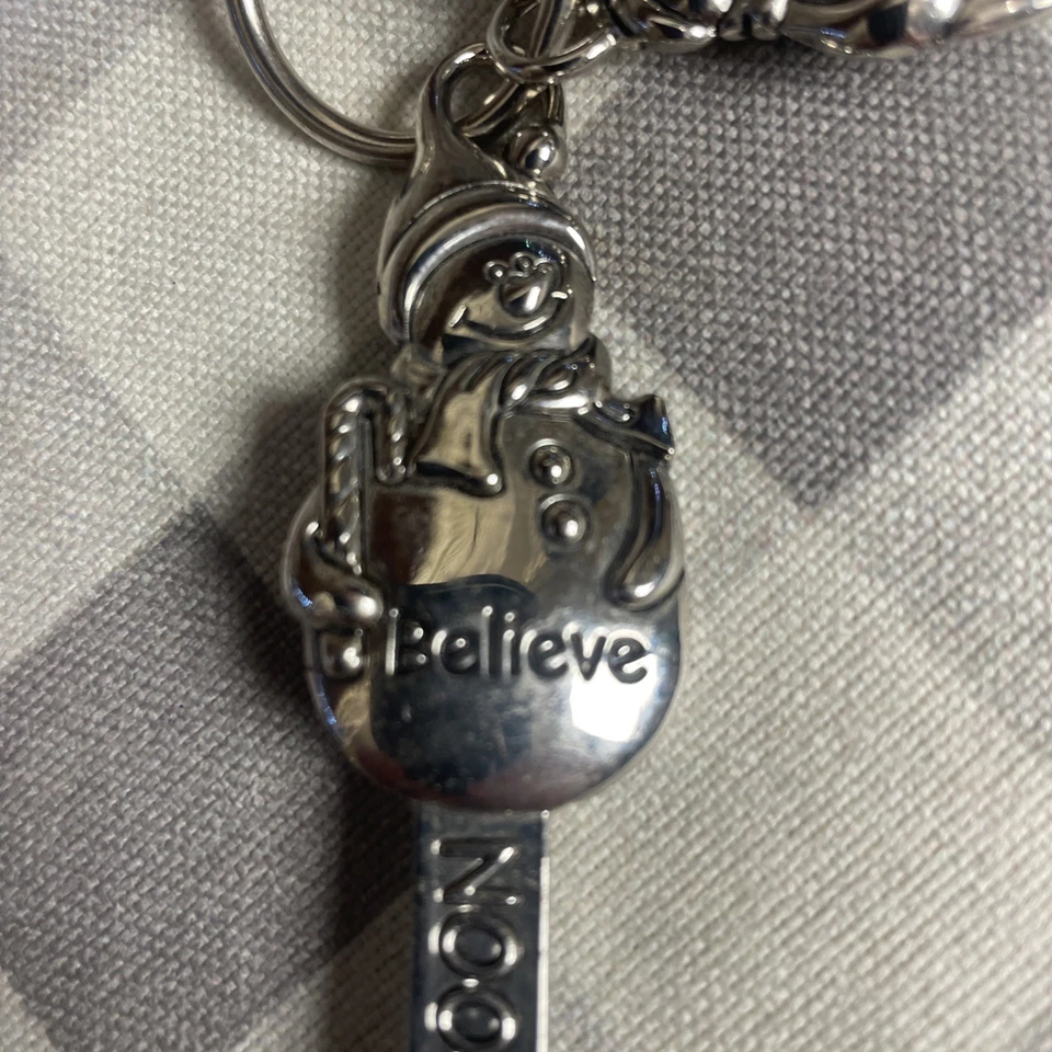 Juego de 4 cucharas medidoras de metal marca Ganz muñecos de nieve temáticos  Foto 3 de 4