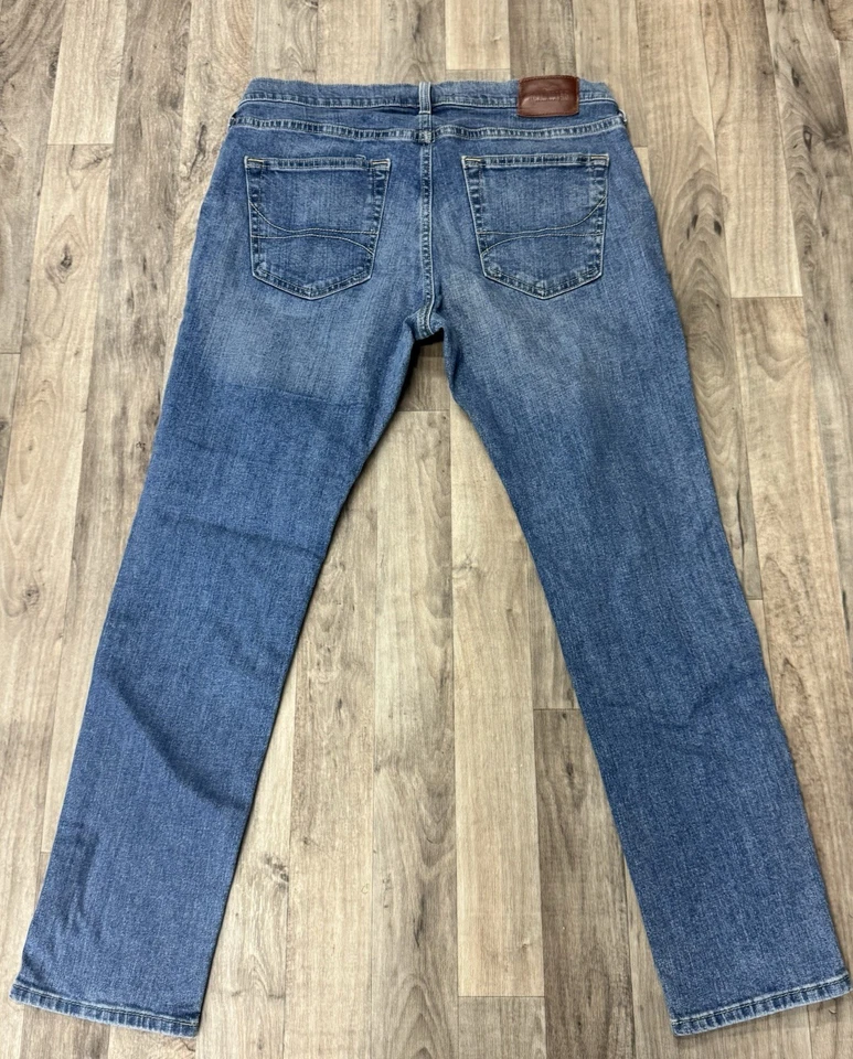 Pantalones de mezclilla elásticos Hollister Epic Flex ajustados 34x30 azul oscuro para hombre Foto 2 de 4