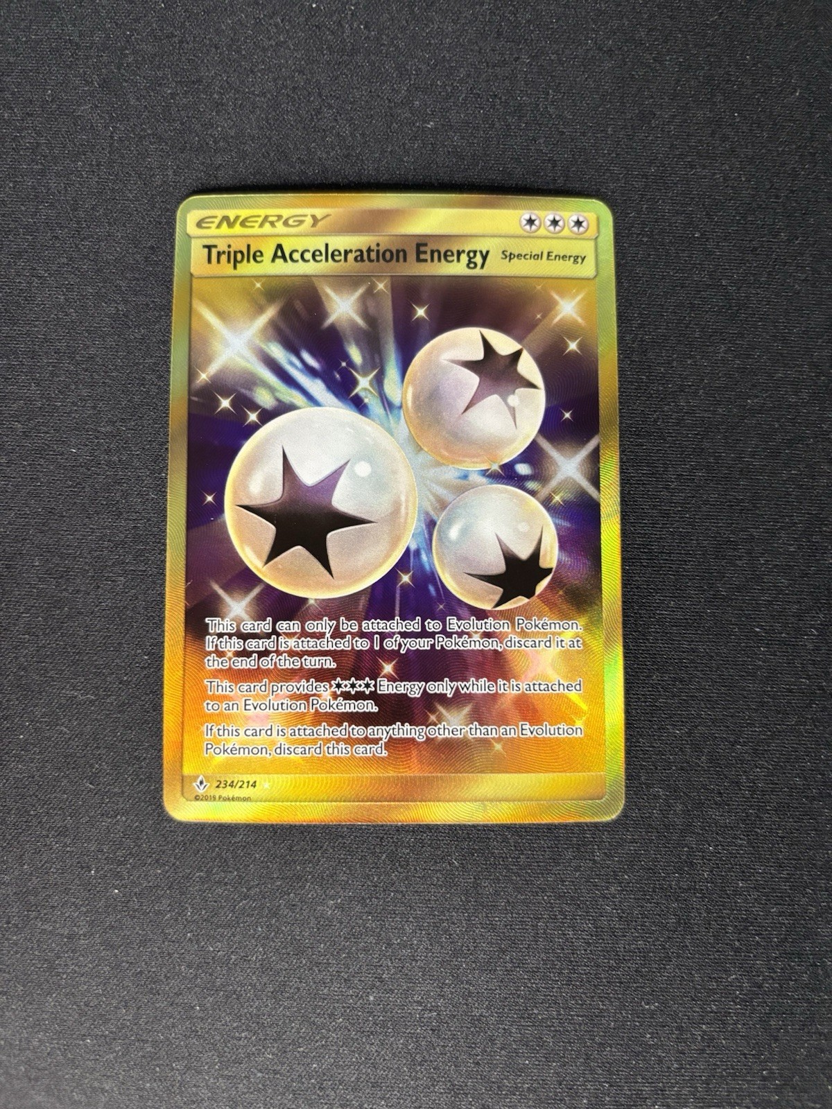 Triple Acceleration Energy – Unbroken Bonds Secret Rare #234/214 – NM