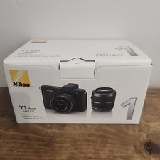 Nikon 1 V1 Mirrorless Digital Camera w/ 2 NIKKOR Lens & Speedlight PLEASE READ