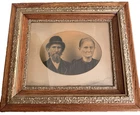 ANTIQUE ORNATE GILT GESSO WOODEN  PICTURE FRAME..MAN AND WOMAN..30X26..DAMAGE