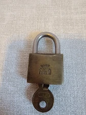 Vintage Aquila brass padlock with key.