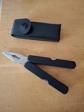 Utility Tool: POCKET KNIFE STYLE WITH PLIERS + 7 OTHER ACCESSORIES; unused