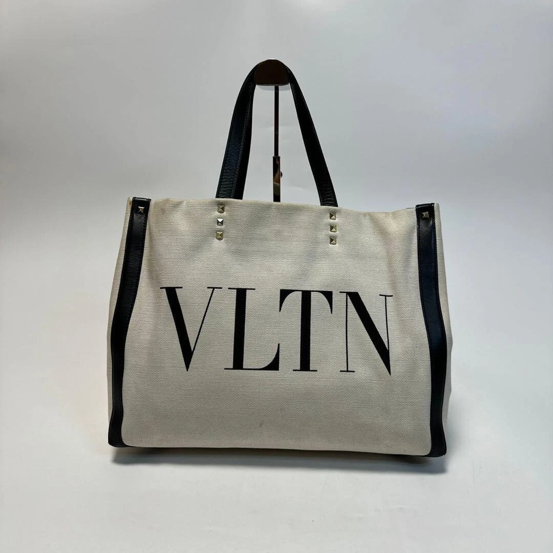 Borsa Valentino tela VLTN pelle borchiata